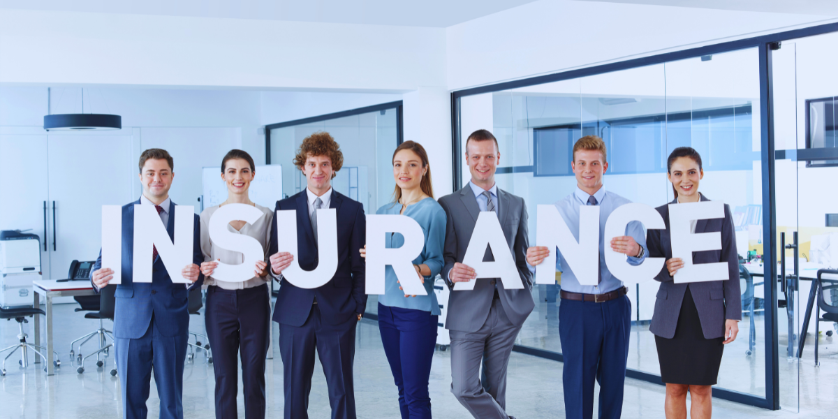 Team Holding Letters